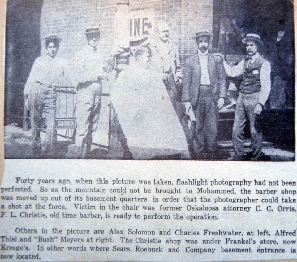 Barbershop group photo taken in Oskaloosa Iowa in 1910