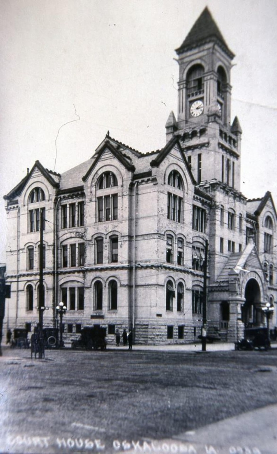 The Mahaska County Courthouse and its bell tower photographed in 1916.