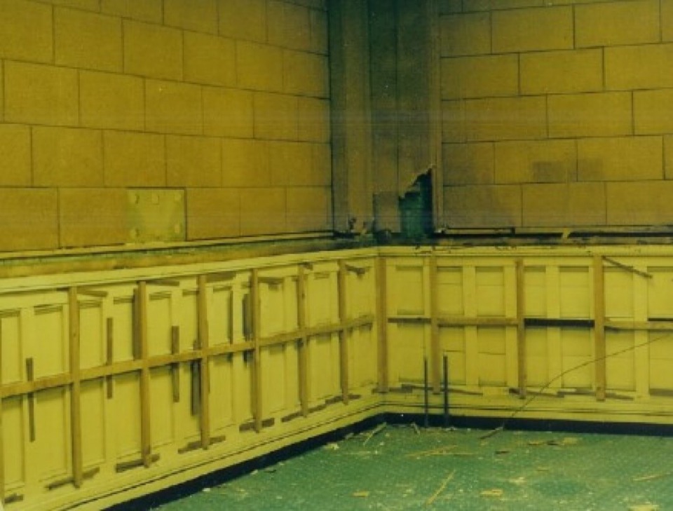 Mahaska County Courthouse courtroom lower trim after having been painted. 