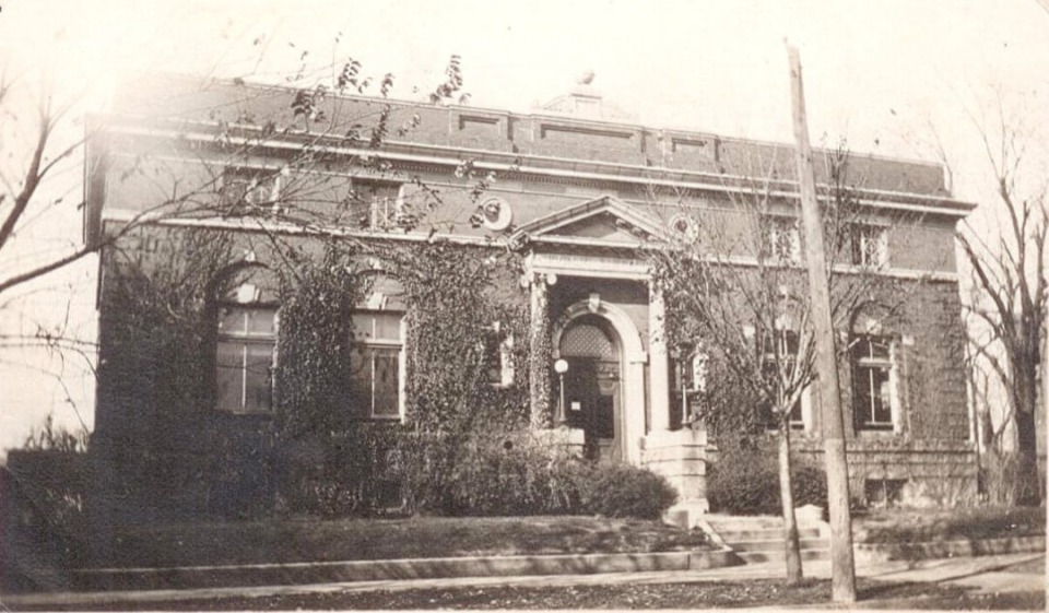 Old Oskaloosa Public Library exterior in black and white.